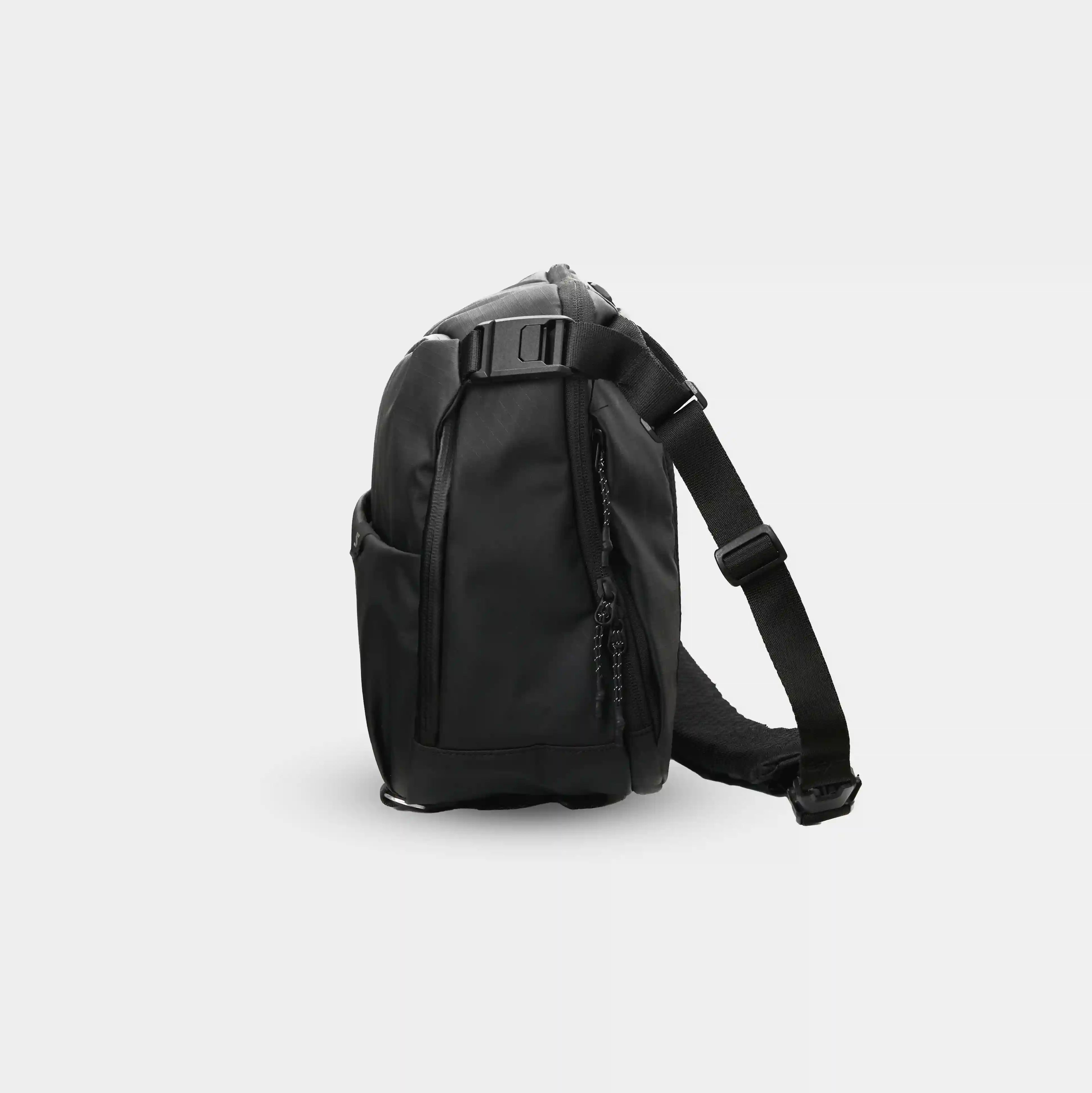 Sakk Nomad sling brašna na fotoaparát a 14" notebook