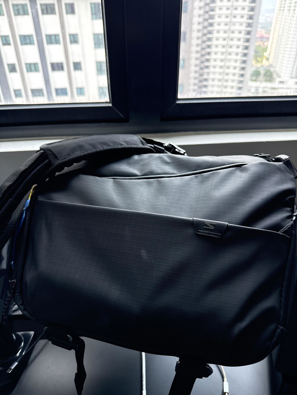 Sakk Nomad sling brašna na fotoaparát a 14" notebook